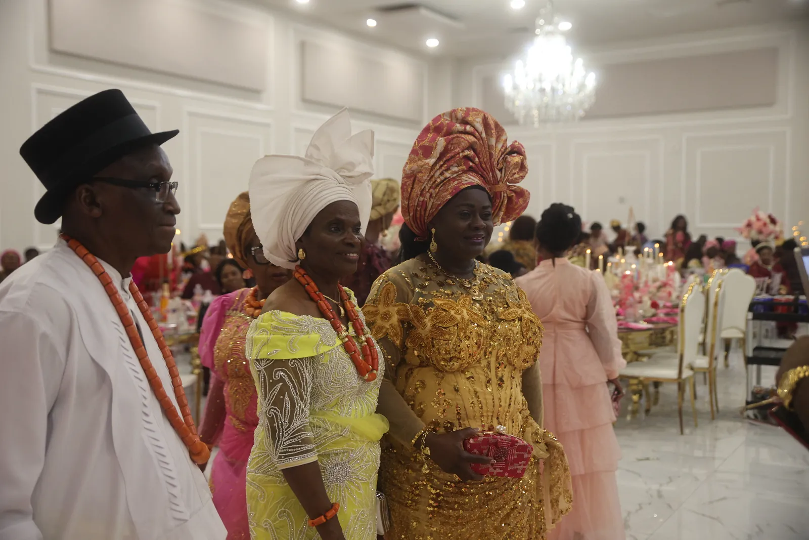 Guests in traditional dress in the main hall